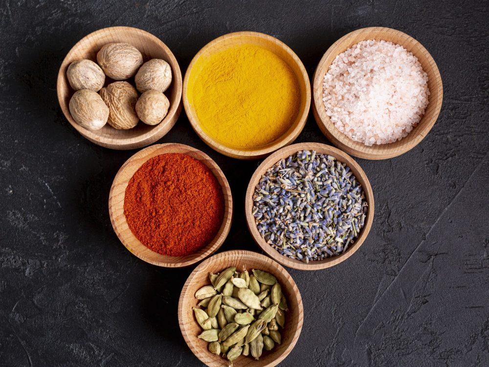top-view-bowls-with-assortment-spices-salt-min